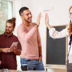co-worker-giving-a-high-five-PWVPE92.jpg