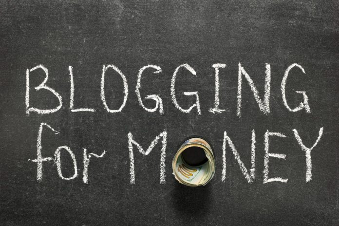Blogging for Money written on chalk board